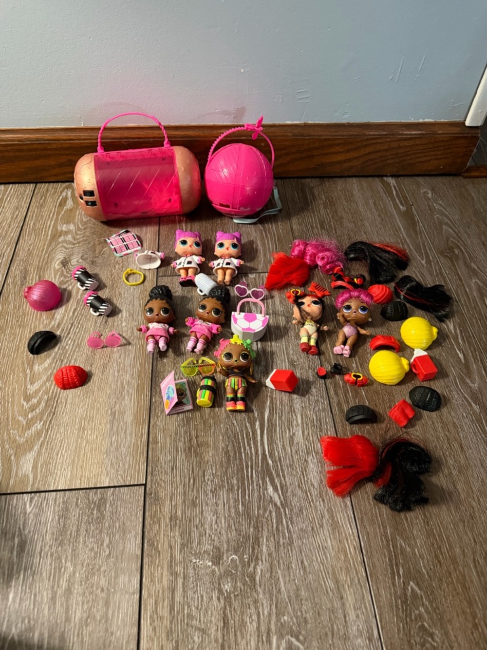 Lot of lol dolls and case